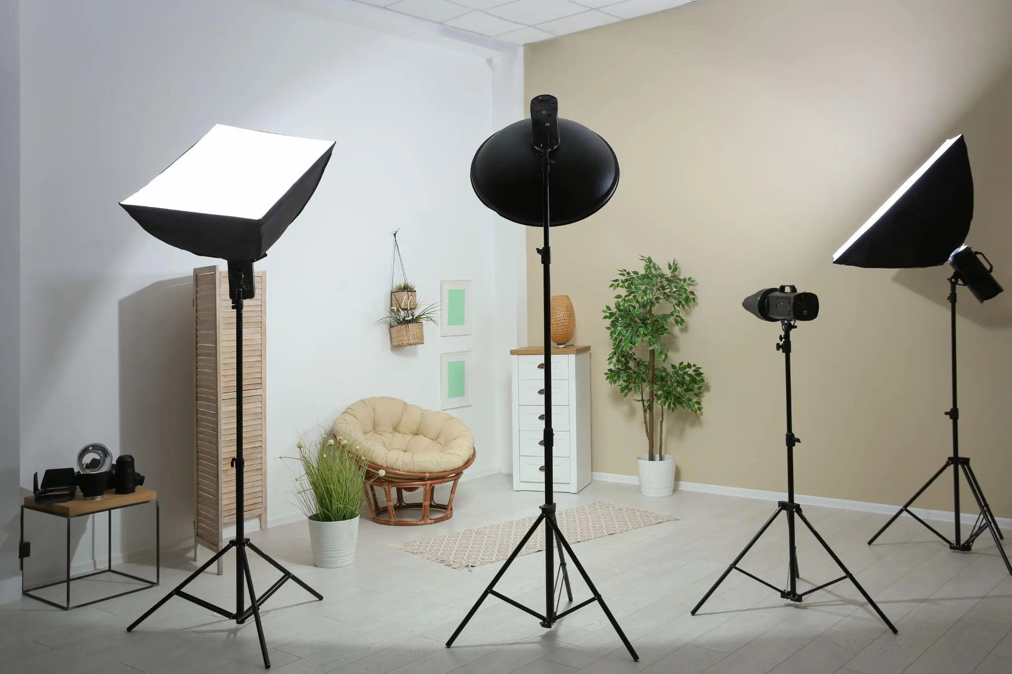 Example of living room interior design and professional equipment in photo studio